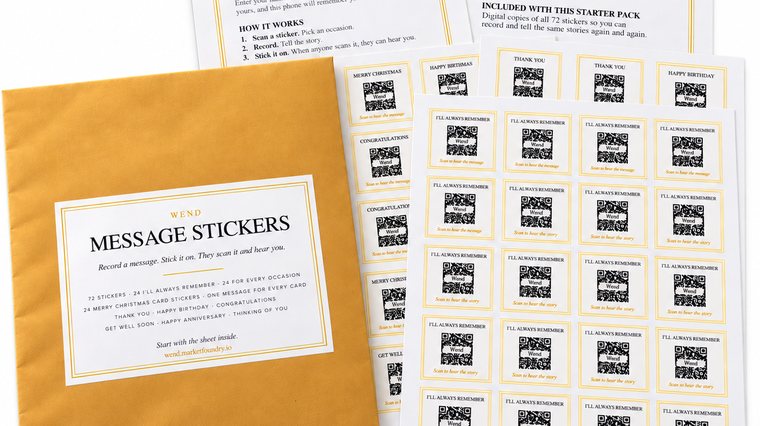 The sticker pack: the kraft envelope, three sticker sheets and the info sheet